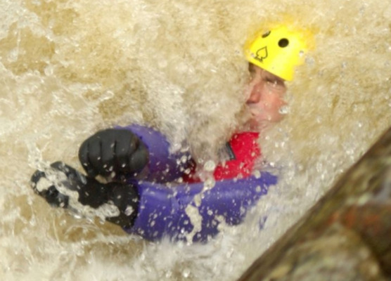 Riding a rapid on a gorge adventure